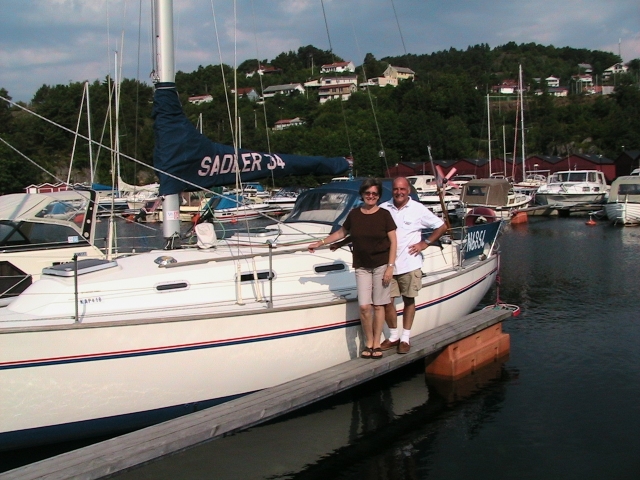 Jeannell and Mike Charman on Kermit their sailboat in Farsund, Norway  